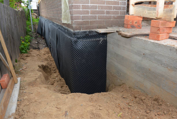 SJ Waterproofing Pros technician performing targeted Crawl Space Encapsulation assessment in Kellyton, AL